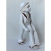 Chłopiec z walizką w stylu art deco wys,21cm szer.17cm