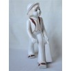 Chłopiec z walizką w stylu art deco wys,21cm szer.17cm